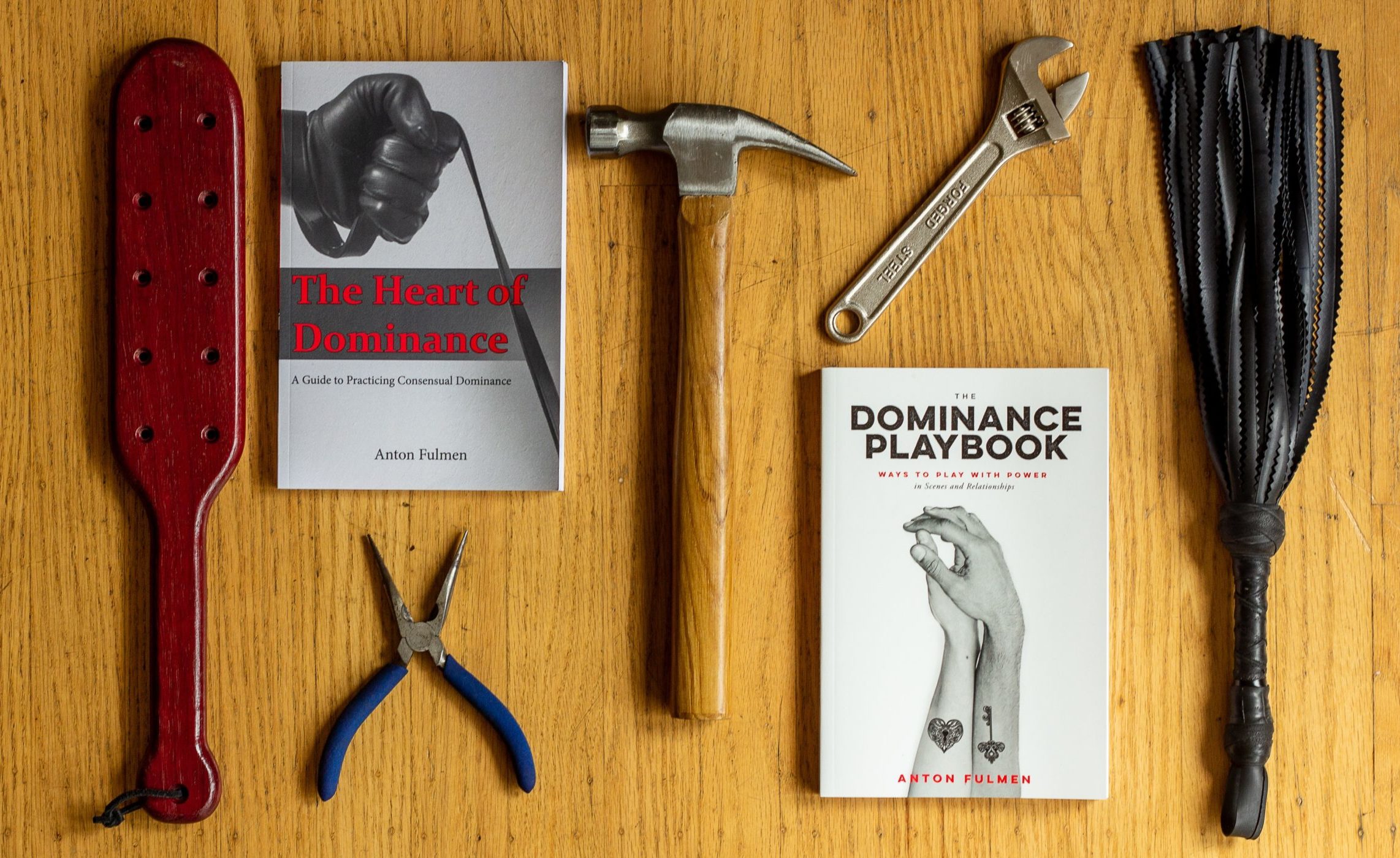 An arrangement of kinky implements mixed with construction tools